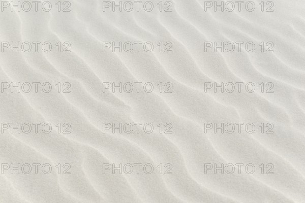 Sand drifts, wave structures in light-coloured sand, background image, North Sea, Juist, East