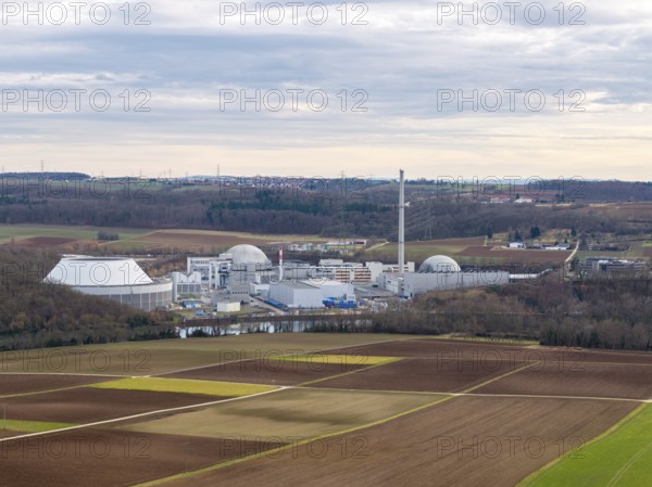 The decommissioned Neckarwestheim nuclear power plant lies in the middle of vast fields and forests