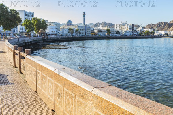 The main road Corniche leads along in an arc to the Bay of Mutrah, Muscat, Arabian Peninsula,