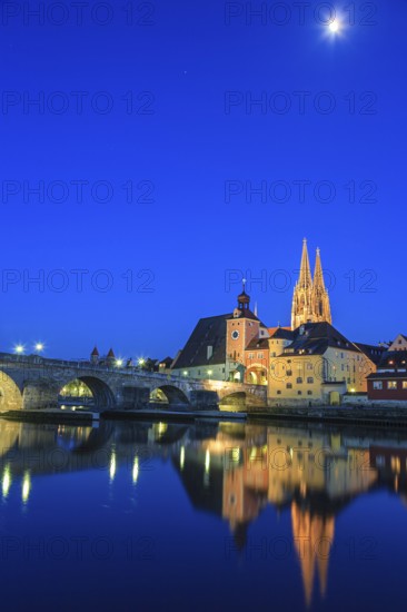 Church and bridge reflected in river, twilight, moon, idyllic, Regensburg Cathedral and stone