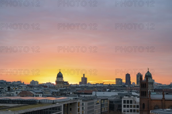 City view at sunset, Friedrichswerder Church, behind German Cathedral and French Cathedral, view