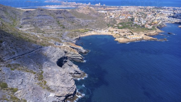 Aerial view of la manga del mar menor with its crystal clear turquoise waters gently lapping