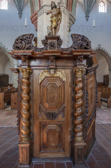 Figure of Jesus with the Lamb of God on the chancel entrance in the church of St Martin, Memmingen,