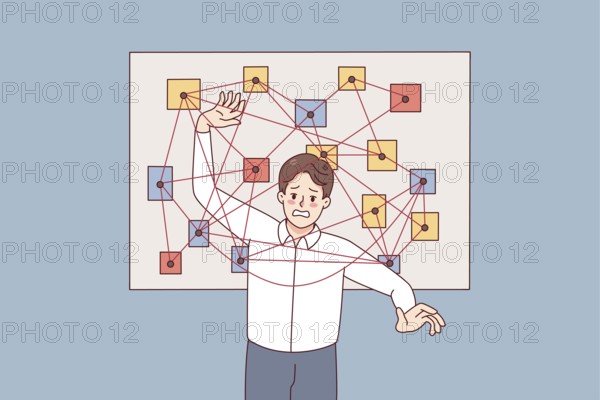 Unhappy man feel stressed with overwhelming work tasks and issues. Confused male employee