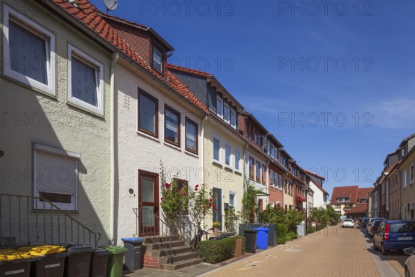 Terraced houses with rubbish bins in the city centre, residential building, Hildesheim, Lower
