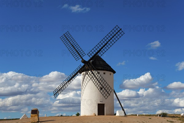 A windmill under a clear, cloudy sky, Campo de Criptana, Ciudad Real province, Castilla-La Mancha,