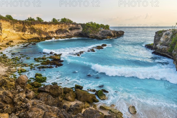 Beach in the Blue Lagoon bay on the holiday island of Nusa Lembongan, blue, algae formation,