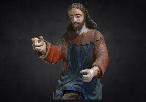 Christ on the palm donkey, on a dark background, detail, wooden figure from around 1400, Museum