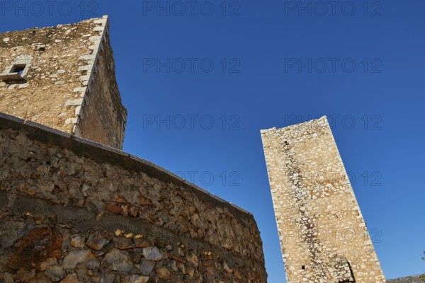 Medieval tower reaching up into a clear blue sky, Flomochori, residential tower village, Mani