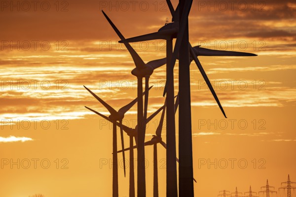 Wind farm near the East Frisian town of Norden, east of the town, sunset, Lower Saxony, Germany,