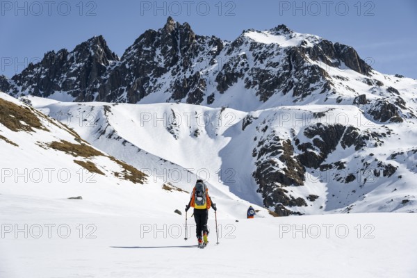 Ski tourers on the Graubünden Haute Route, Snow-covered mountains, Winter in the Albula Alps,