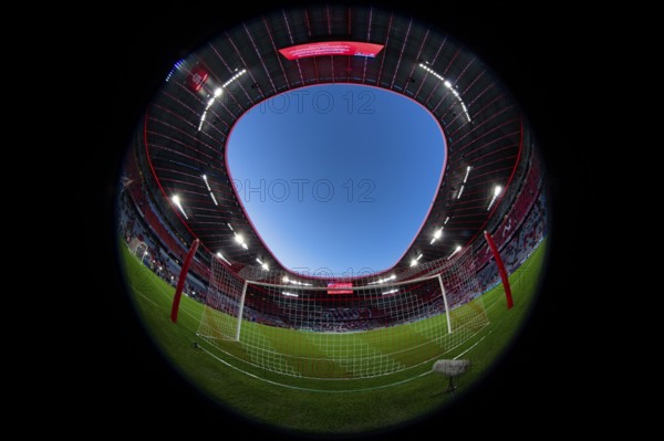 Overview, interior, floodlit match, behind-the-goal perspective, goal net, blue hour, fisheye shot,