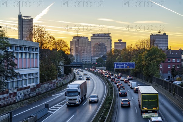 Evening traffic, partly with traffic jams, slow-moving traffic on the A40 motorway, skyline of