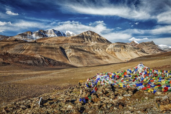 Buddhist prayer flags (lungta) on top of Baralacha La pass on Manali-Leh road. Baralacha La Pass,