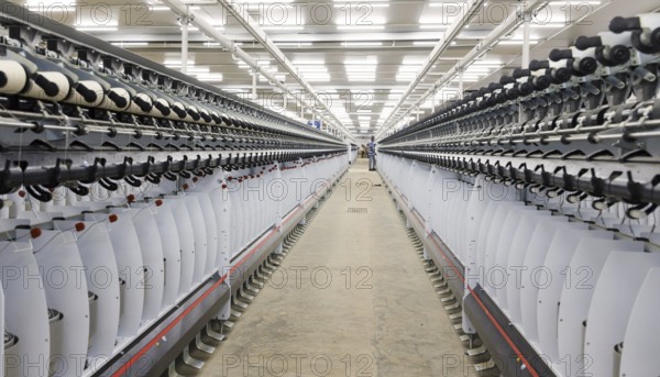 BENIN TEXTILE CORPORATION BENIN, Spun yarn is assembled on reels in a textile factory near Cotonou