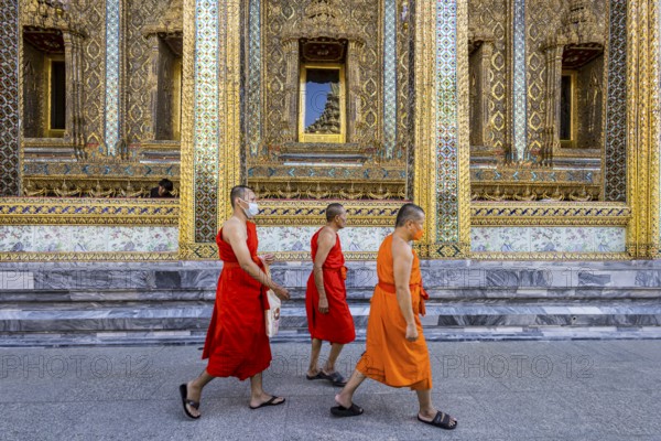 Wat Phra Kaeo temple, royal palace. Royal chapel with Buddhist monks and novices. Bangkok,