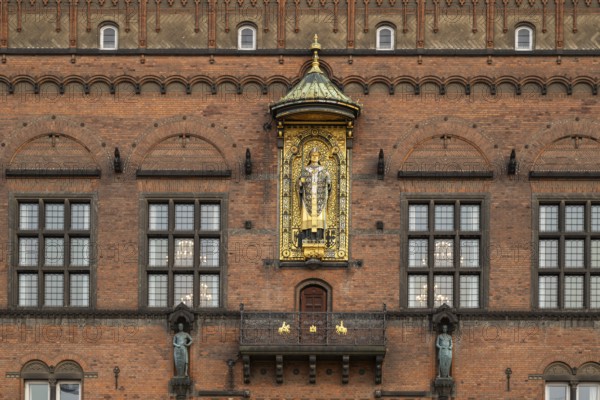 Brick façade with gilded sculpture of Bishop Absalon, Town Hall in the National Romantic style by