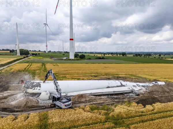 Demolished tower of a 20 year old wind turbine, in the Werl wind farm, 5 old Enercon E-66 turbines