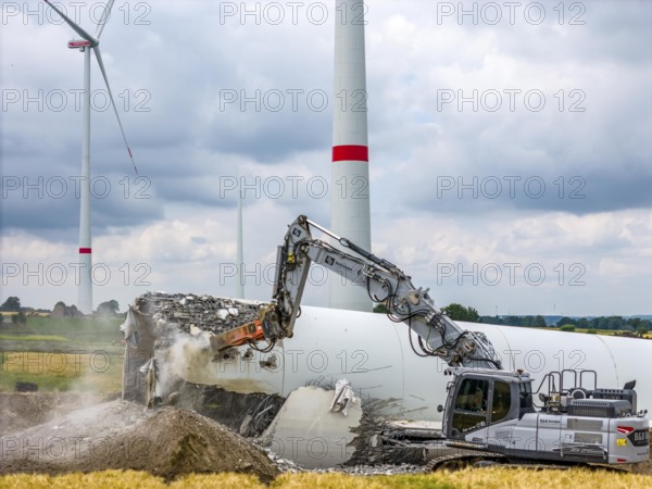 Demolished tower of a 20 year old wind turbine, in the Werl wind farm, 5 old Enercon E-66 turbines