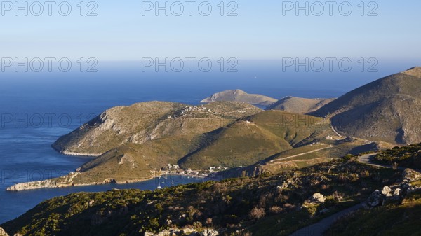 View of a picturesque coastline with mountains and the sea under a blue sky, southern tip, Mani