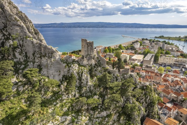 The old town centre of Omis with the ruins of the Mirabella or Peovica fortress seen from above,