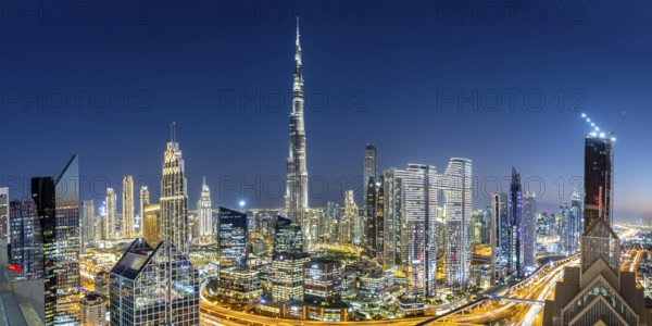 Burj Khalifa skyline tallest building in the world panorama from above in Downtown at night in