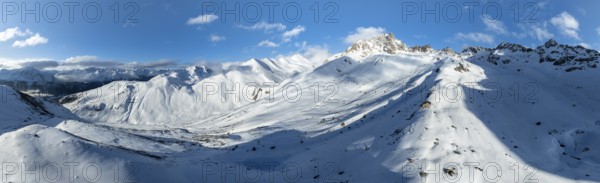 Alpine panorama, aerial view with Kesch hut, behind mountain peak Piz Kesch, Albula Alps, Rhaetian