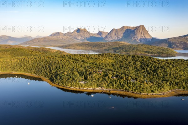 Aerial view over the fjord Efjord south of Narvik, seen at sunset, leisure boats anchor, holiday