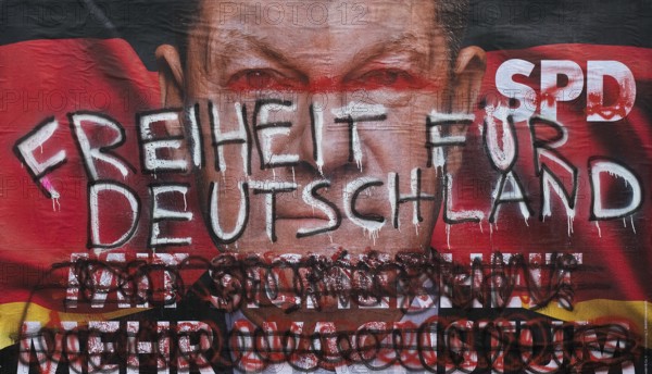 Denigration of a large poster for the 2025 federal election by the SPD with Olaf Scholz, Witten,