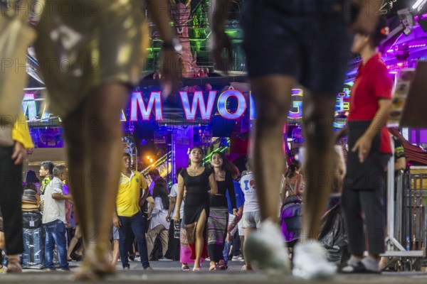 Crowds of people on Bangla Street in the evening. Nightlife on Bangla Walking Street with go-go