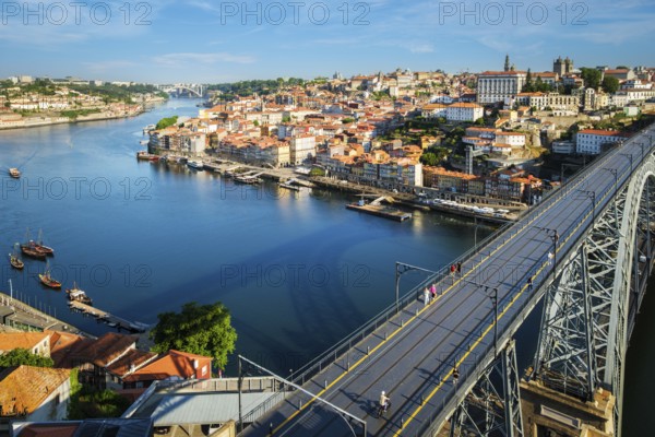 View of Porto city and Douro river and Dom Luis bridge I from famous tourist viewpoint Miradouro da