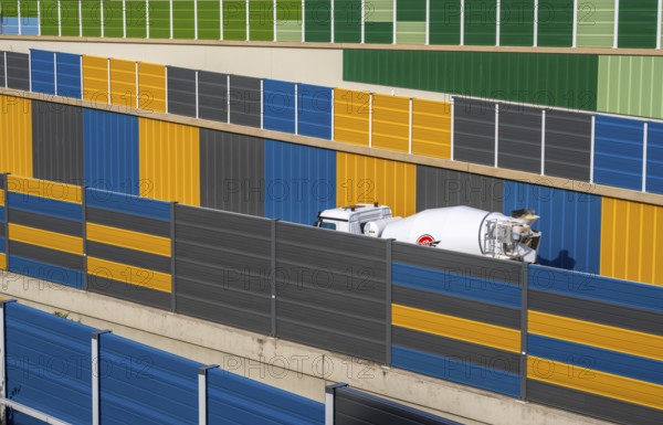 Colourful noise barriers on the A52 motorway, at the Essen-Rüttenscheid junction, the noise