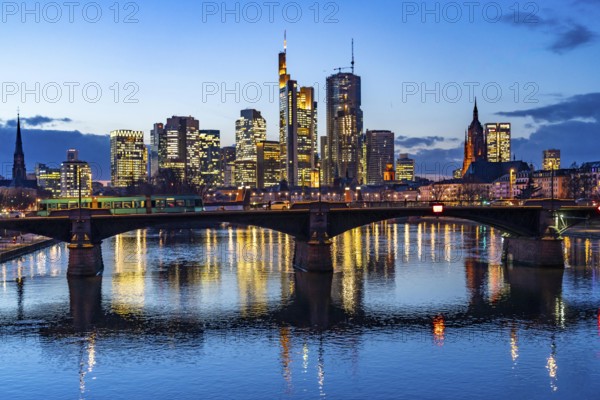 Skyline of the city centre of Frankfurt am Main, river Main, dusk, Ignatz-Bubis-Brücke, Hesse,