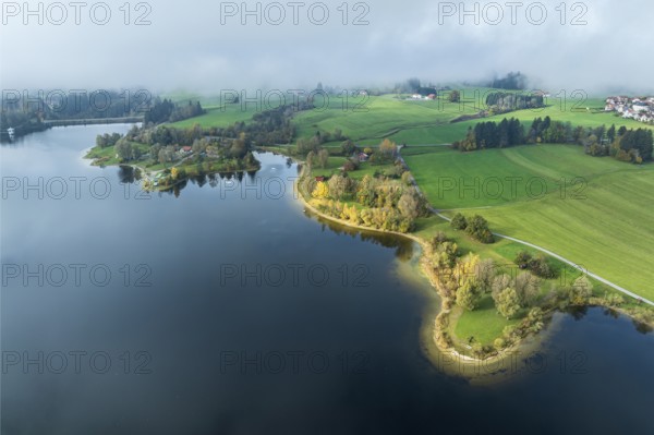 Sports facility and bathing area, lake Rottachsee, shore covered with fog, autumn, aerial view,