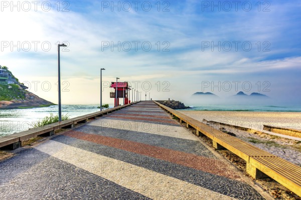Breakwater pier on Barra da Tijuca beach in Rio de Janeiro at dawn Rio de Janeiro, RJ, Brazil,