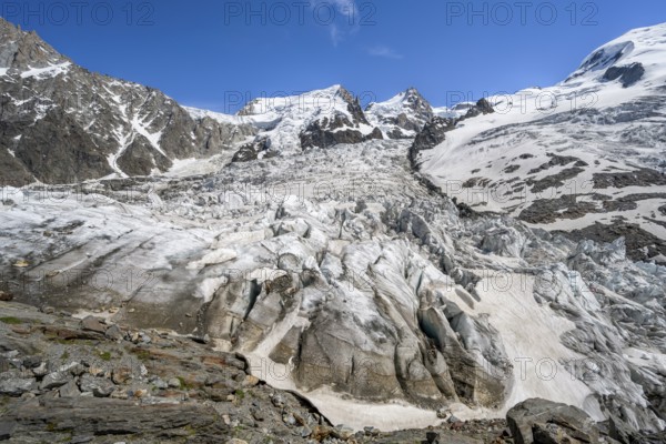 High alpine glaciated mountain landscape, La Jonction, Glacier des Bossons meets Glacier de