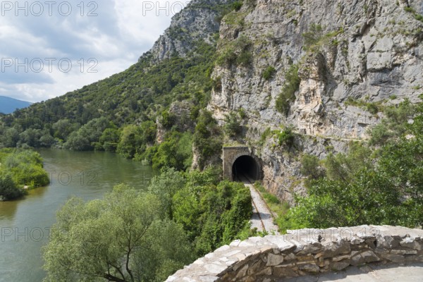 An old railway tunnel on a hiking route along a picturesque river, River Nestos or Mesta, Nestos