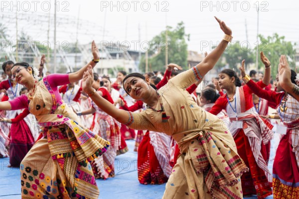 Participants with instructors dance in a Bihu dance workshop ahead of Rongali Bihu Festival, in