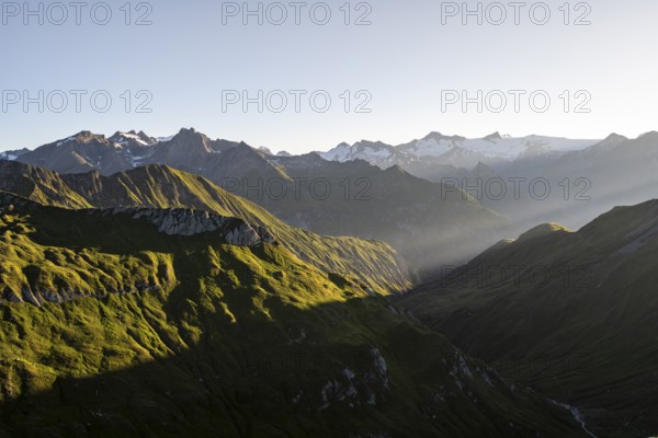 Mountain landscape at sunrise, view of mountain peaks of the Venediger group and into the