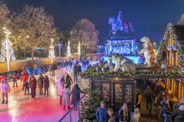 Christmas market with ice rink at Heumarkt, in the historic city centre of Cologne, North