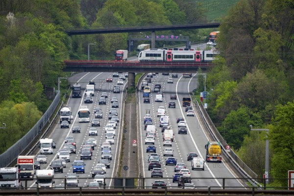 Local train S-Bahn, Regiobahn, S28, crossing the motorway A3, traffic on 8 lanes, incl. the