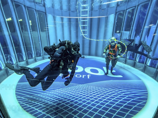 View into diving tower of Messe boot Düsseldorf, on the left recreational diver, on the right