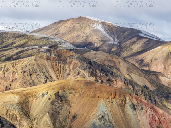 Early snow on the colorful rhyolite mountains, mt. Brennisteinsalda, lava fields, Landmannalaugar,