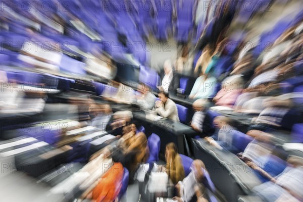 Zoom effect photo, Member of Parliament in the plenary hall of the German Bundestag, Berlin, 13