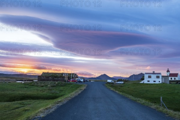 Sunset at Mödrudalur farm and guesthouse, church, dramatic cloud formation, northwest of