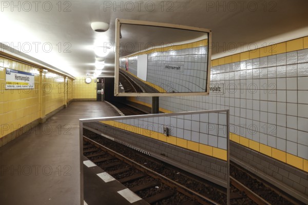Mirrors on an underground platform at Hermannplatz station. The mirrors are used by the drivers for