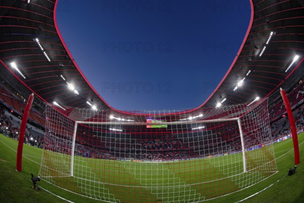 Overview, interior, floodlit match, behind-the-goal perspective, goal net, blue hour, fisheye shot,