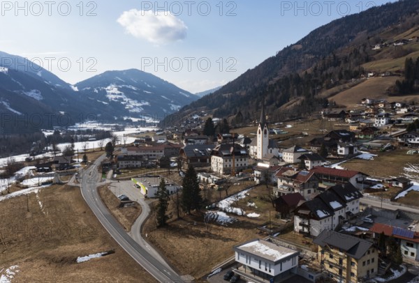 Drone shot, view of village with parish church, Rangersdorf, Mölltal, Carinthia, Austria, Europe
