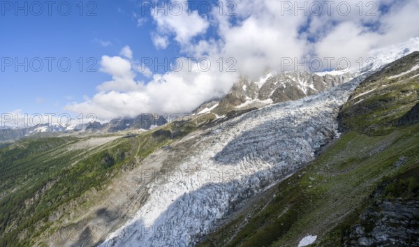 Mountain landscape with glacier Glacier des Bossons and summit of the Aiguille du Midi, Chamonix,