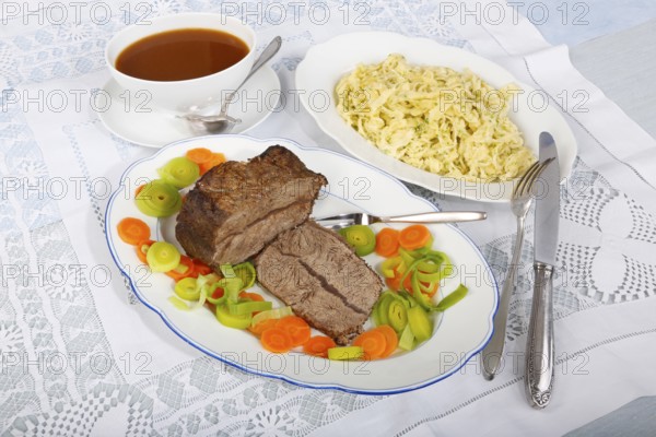 Swabian cuisine, roast beef, roast ox, herb spaetzle, meat dish, gravy, carrot vegetables, leek,